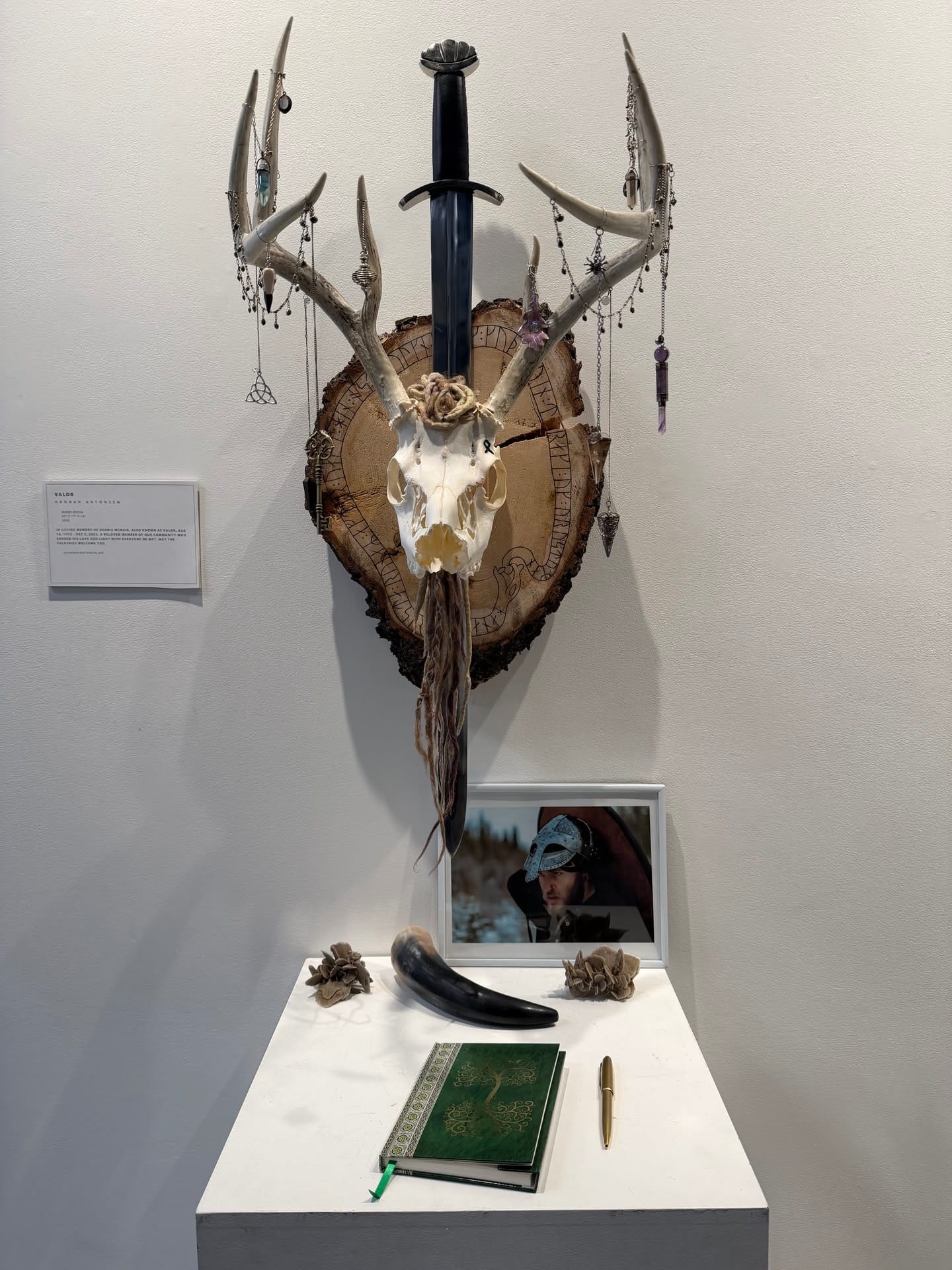 Antler, skull, sword, and wood sculpture in the 2026 heARTburn exhibition